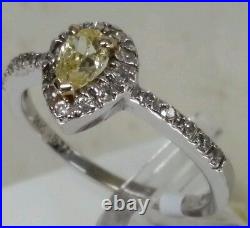 14k white gold vintage & antique fine ring. 0.36ct cannery fancy yellow diamond