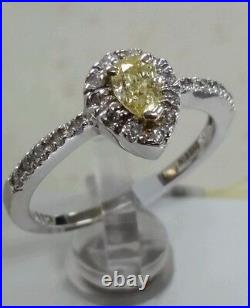 14k white gold vintage & antique fine ring. 0.36ct cannery fancy yellow diamond