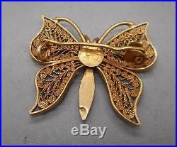 Ancienne broche papillon en or 18 carats