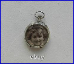Ancienne coque de montre à gousset / porte photo en argent massif N°1