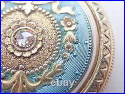 Ancienne montre bijoux à gousset en or 18 K avec diamant en son centre