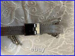 Ancienne montre ceinture Timex Bijou argent remontage manuel accessoire