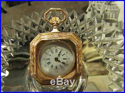 Ancienne montre de col a gousset en or massif 18 carats monogramme MC a pile