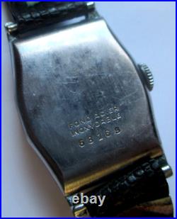 Ancienne montre mécanique bracelet lézard estampillée numérotée bijou vintage 90