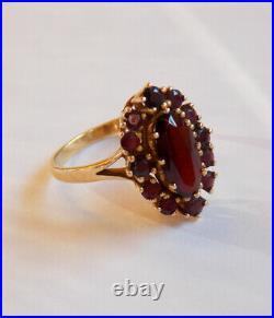 Bague marquise ancienne en or 18k avec des grenats