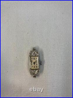 Bijou ancien, montre en platine et diamants Art déco vers 1930