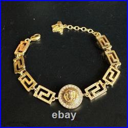Bracelet Méduse Versace en or avec pierres bijoux anciens du Japon