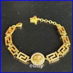 Bracelet Méduse Versace en or avec pierres bijoux anciens du Japon