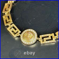 Bracelet Méduse Versace en or avec pierres bijoux anciens du Japon
