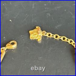 Bracelet Méduse Versace en or avec pierres bijoux anciens du Japon