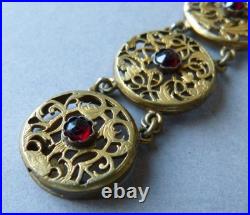 Bracelet ancien en coq de montre à gousset et pierres rouges