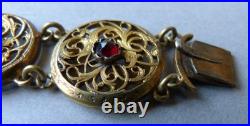 Bracelet ancien en coq de montre à gousset et pierres rouges