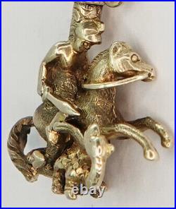Clé de montre antique en or jaune, Saint-Georges et dragon