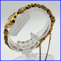 Élégante montre pour femme SEIKO ton or quartz bijoux analogiques style ancien