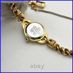 Élégante montre pour femme SEIKO ton or quartz bijoux analogiques style ancien