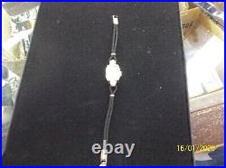 Montre Vintage Clinton Femme 17 Jewel Or Blanc 14K 4 Diamants. Juste d'entretien