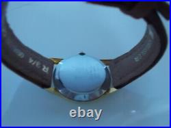Montre-bracelet vintage Mr. Peanut de fabrication suisse vent avec date sur le bas