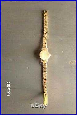 Montre femme ancienne LIP modèle Dauphine Boitier or 18 K, bracelet plaqué gold
