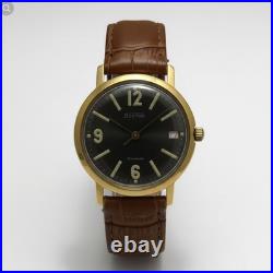 Montre mécanique ancienne URSS plaqué or 18 bijoux date style militaire 40 mm