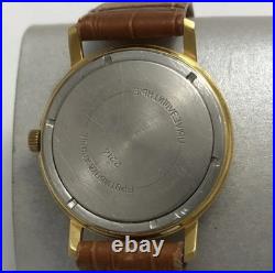 Montre mécanique ancienne URSS plaqué or 18 bijoux date style militaire 40 mm