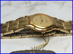 NEW OLD STOCK GOLD TONE FEMME UNIVERSAL GENEVE montre-bracelet