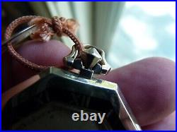 Rare montre de poche octogonale antique Elgin art déco lunette émail vers 1928